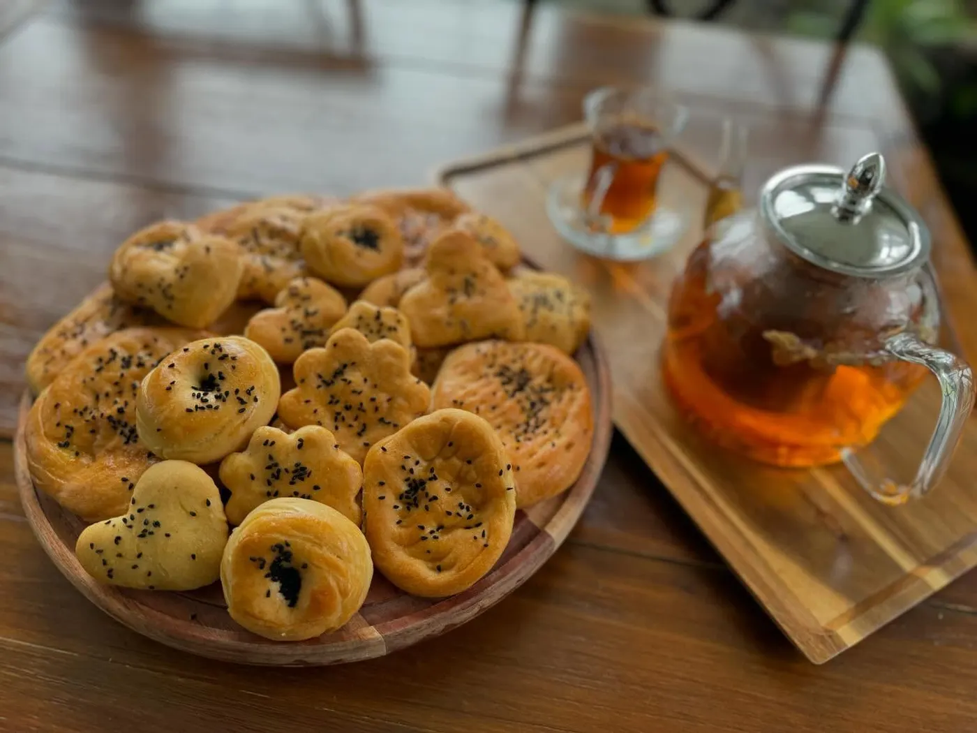 Home kitchen table with bread and tea reflecting Afghan hospitality